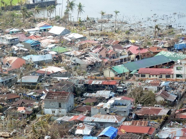 ฟิลิปปินส์ต้องใช้เวลา 5 ปีเพื่อฟื้นฟูพัฒนาประเทศหลังพายุไต้ฝุ่นไห่เยี่ยน - ảnh 1